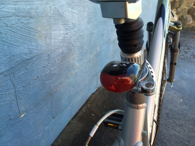 Sprung seat post and wide seat. Rear light included.